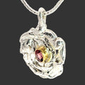 Gold-Wrapped Violet Spinel in Organic Mitsuro Swirled Sterling Pendant